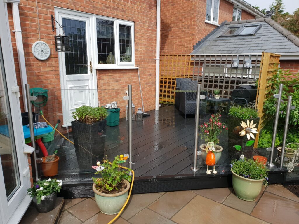 After decking renovation with glass rails